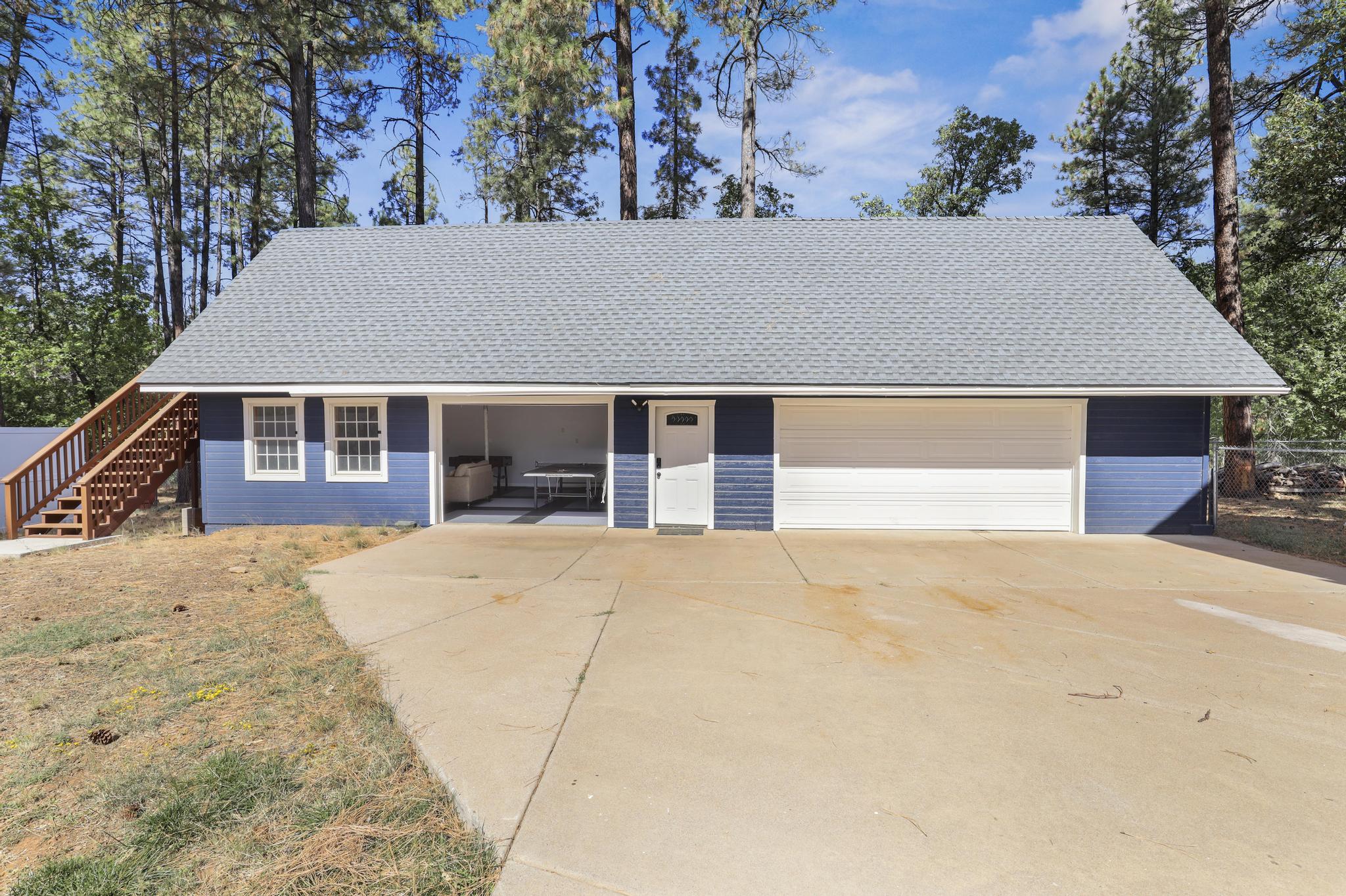 Dedicated office with desk and windows on multiple sides